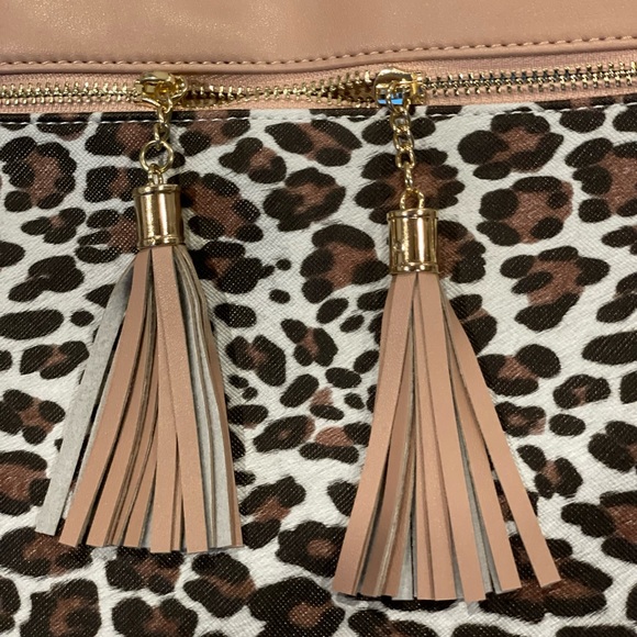 Leopard print cross body purses 9”x9”. Has a blush undertone. - Picture 3 of 7